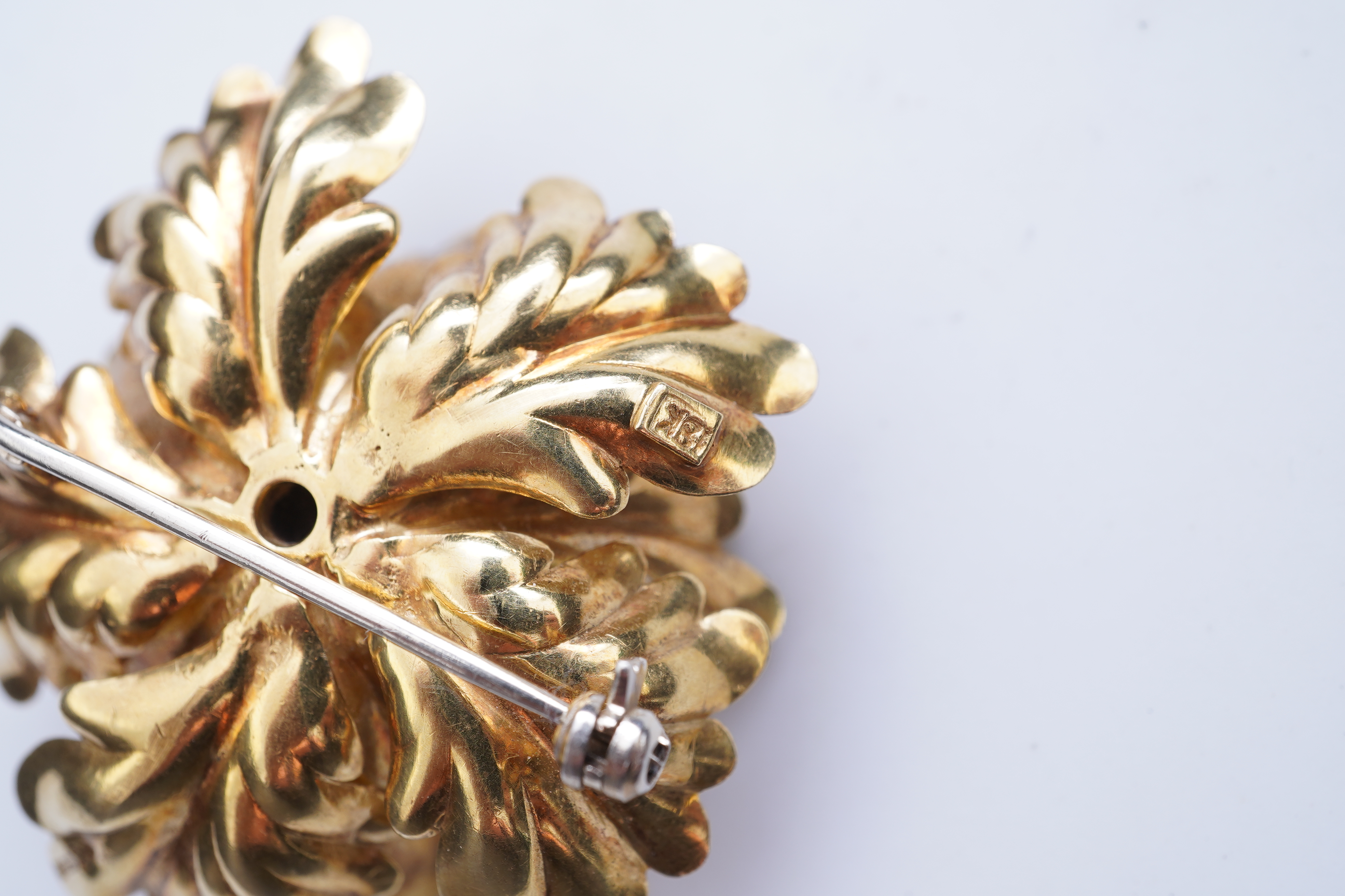 A gold and sapphire brooch, third quarter 20th century